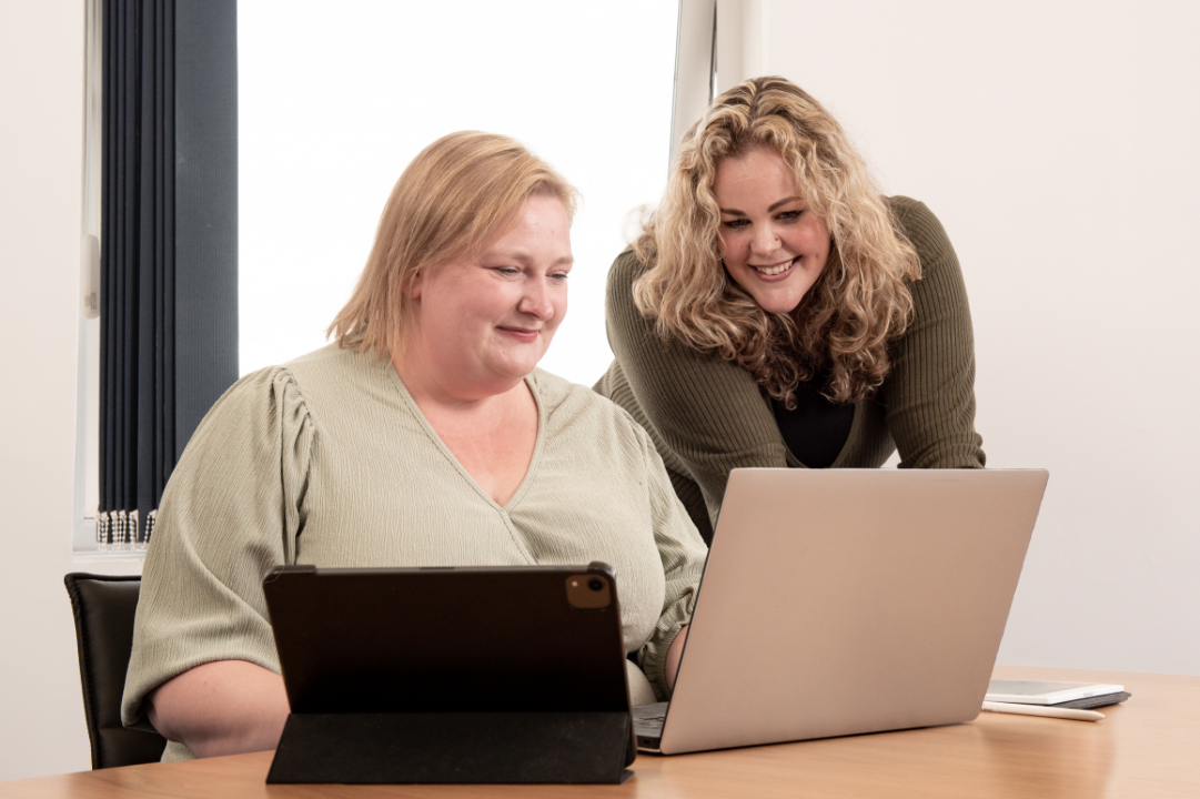 Chloe and Amy at desk